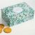 Boite de biscuits Dans un jardin